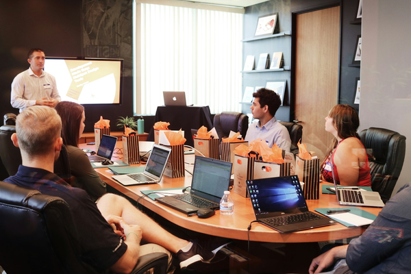 Financial institution compliance team reviewing evidence and controls